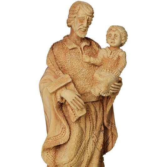 Statue of Joseph Holding Baby Jesus
